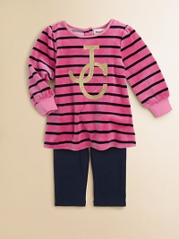 Crafted in plush velour, this stunning tunic features bold stripes and glimmering logo detail, paired with cozy leggings. Tunic Round necklineLong sleevesBack snaps Leggings Elastic waistbandCotton/Polyester/SpandexMachine washImported Please note: Number of snaps may vary depending on size ordered. Crafted in plush velour, this stunning tunic features bold stripes and glimmering logo detail, paired with cozy leggings. Tunic Round necklineLong sleevesBack snaps Leggings Elastic waistbandCotton/Polyester/SpandexMachine washImported Please note: Number of snaps may vary depending on size ordered.