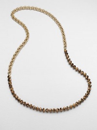 An artistic design with faceted beads on a double link chain. Glass beadsGoldtone brassLength, about 35Slip-on styleImported An artistic design with faceted beads on a double link chain. Glass beadsGoldtone brassLength, about 35Slip-on styleImported