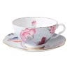 Step into a delightful garden party with Wedgwood's whimsical Cuckoo collection. Inspired by nature, this richly accented tea cup and saucer adds a flourish of color to your table with sophisticated and lively style.