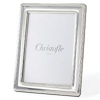 This striking Christofle Solide frame is etched with a border in gleaming silver plate. This striking Christofle Solide frame is etched with a border in gleaming silver plate.