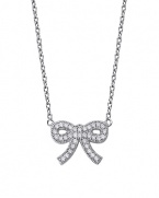 Platinium vermeil and cubic zirconia are all wrapped up in a pretty bow on this feminine-fabulous necklace from Crislu.