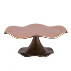 The Copper Canyon Collection was inspired by the designer's many trips to the canyons of the southwest. Grand Canyon, Arches National Park, Bryce Canyon and others. These canyons are carved from water and wind. The coppery sand and desert flora are referenced by the copper and verdigris on the ripples and ridges of Nambé's Copper Canyon Collection.