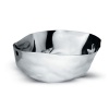 Designed by Lluis Clotet, this artfully-shaped salad bowl features unexpected lines and undulating surfaces.