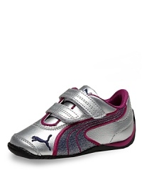 PUMA's fun, flashy metallic sneakers provide support and cutting-edge style for your sporty gal. PUMA's fun, flashy metallic sneakers provide support and cutting-edge style for your sporty gal.