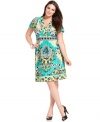 Liven up your work look with NY Collection's short sleeve plus size dress, finished by an eye-catching print!