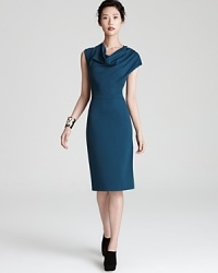 A voluminous cowl neckline lends effortless elegance to this timeless Escada dress in flattering jersey. A voluminous cowl neckline lends effortless elegance to this timeless Escada dress in flattering jersey.