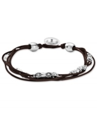 Added attractions. Fossil's multistrand chocolate-colored leather bracelet features silver-tone beads and sparkling accents for a radiant touch. Approximate length: 7-1/2 inches. Added attractions. Fossil's multistrand chocolate-colored leather bracelet features silver-tone beads and sparkling accents for a radiant touch. Approximate length: 7-1/2 inches.