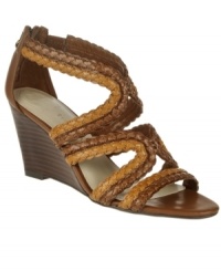 Break out of your shell this season. The Peanut sandal by Etienne Aigner shows off your breezy style with folksy braiding and a trendy, elevated wedge. Break out of your shell this season. The Peanut sandal by Etienne Aigner shows off your breezy style with folksy braiding and a trendy, elevated wedge.