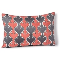 Add a fresh dose of bright color and pattern to your bedroom with this bold decorative pillow. Add a fresh dose of bright color and pattern to your bedroom with this bold decorative pillow.