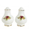 This popular bone china pattern surrounds blooming sprays of colorful English roses with hand-applied bands of 22K gold. Shown at front center.