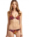 THE LOOKAllover leopard printPadded, push-up cups with underwire supportRuched halter ties at back neckCenter back tie closureTHE MATERIAL92% nylon/8% lycraFully linedCARE & ORIGINHand washImportedPlease note: Bikini bottom sold separately. 