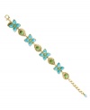 Spruce up your style just in time for spring! 2028's fresh, new bracelet features sparkling blue zircon and green crystals set in brass tone mixed metal. Approximate length: 6 inches.