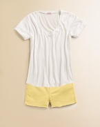 A little rough around the edges, this frayed pair of vivid shorts will take her from the classroom to the schoolyard in style.Button closureWaistband with belt loopsZip fly5-pocket styleFrayed hem96% cotton/4% spandexMachine washImported