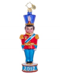 A good little soldier, this brilliantly handcrafted ornament from Christmas Radko will serve you well for many Christmases to come. Dated for the season, with sparkling glitter accents. A good little soldier, this brilliantly handcrafted ornament from Christmas Radko will serve you well for many Christmases to come. Dated for the season, with sparkling glitter accents.