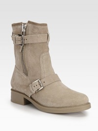 Adjustable buckled straps add a touch of edge to this comfortable suede staple. Rubber heel, 1¼ (30mm)Shaft, 7½Leg circumference, 10½Suede upperSide zip and adjustable buckle strapsLeather liningRubber solePadded insoleImported Adjustable buckled straps add a touch of edge to this comfortable suede staple. Rubber heel, 1¼ (30mm)Shaft, 7½Leg circumference, 10½Suede upperSide zip and adjustable buckle strapsLeather liningRubber solePadded insoleImported
