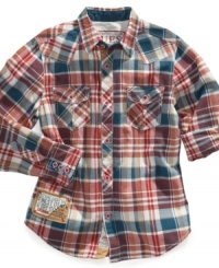 He'll rock the rugged look in this handsome plaid shirt from Guess. He'll rock the rugged look in this handsome plaid shirt from Guess.