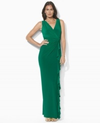 A soft matte jersey construction, designed with a hint of stretch, makes this magnetizing Lauren Ralph Lauren's evening gown as fabulous to wear as it is to behold. A soft matte jersey construction, designed with a hint of stretch, makes this magnetizing Lauren Ralph Lauren's evening gown as fabulous to wear as it is to behold.