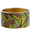 Infuse your look with the bold colors and exotic prints of Brasil. Crafted in gold tone mixed metal Haskell's Leaf bangle features brown and green leaf details and a hinge clasp. Approximate diameter: 2-1/2 inches. Approximate length: 8 inches. Item comes packaged in a green gift box.