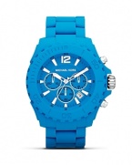 Be a good sport: This boldly colored silicone watch from MICHAEL Michael Kors is a high-impact accessory, featuring an over sized bezel and advanced movement.