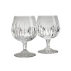 Roundly respected for its history of craftsmanship, Reed & Barton preserves its old-world heritage with sparkling designs that glimpse the future, as with the brilliantly contemporary cutting on these shimmering brandy glasses.