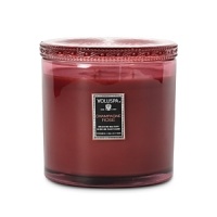 Lend warmth and ambience to your space with this softly scented candle from Voluspa. Smooth coconut-based wax blended with essential oils in a variety of scents is poured in a sturdy glass lidded pot. Lend warmth and ambience to your space with this softly scented candle from Voluspa. Smooth coconut-based wax blended with essential oils in a variety of scents is poured in a sturdy glass lidded pot.