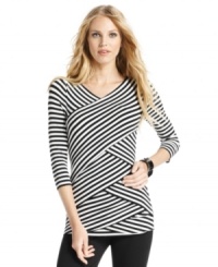 Think outside the lines: Vince Camuto outfits this top with crisscrossing panels of stripes for a striking bandage-style look. (Clearance) Think outside the lines: Vince Camuto outfits this top with crisscrossing panels of stripes for a striking bandage-style look. (Clearance)