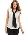 A bold, contrasting tie neckline gives this Calvin Klein top a look that's timeless and modern all at once.