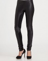 Wear now and love forever-- these lustrous leather leggings have modern contrast panels and a secure elastic waistband. Elastic waistbandRise, about 7Inseam, about 33Body: Lamb leather; Contrast: 85% polyester/15% spandexDry cleanImported of Italian fabricModel shown is 5'10 (177cm) wearing US size 2.