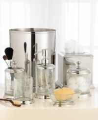 Tidy up in in the sleekly mod style of the Crackle Glass wastebasket, featuring a shiny nickel finish and clean lines. Tidy up in in the sleekly mod style of the Crackle Glass wastebasket, featuring a shiny nickel finish and clean lines.