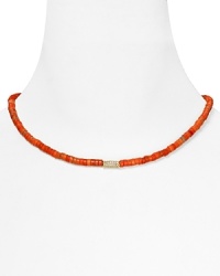 Basic yet bold. Let MICHAEL Michael Kors lend every look a colorful touch with this simple strand of coral beads, accented by a gold plated metal bar. Basic yet bold. Let MICHAEL Michael Kors lend every look a colorful touch with this simple strand of coral beads, accented by a gold plated metal bar.