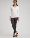A seasonless essential in smooth, soft, feather-light stretch jersey. Scooped neckline Three-quarter sleeves Cotton/spandex; hand wash Imported