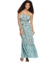 MM couture's flirty maxi dress looks so cute for all those sunny days ahead! An on-trend feather print gives it edge.