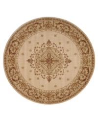 Evoking the opulence of European decor, this round rug features an elegant medallion design in shades of gold on a cream background dotted with rosettes. Woven of premium wool for rich texture and indulgent softness. Evoking the opulence of European decor, this round rug features an elegant medallion design in shades of gold on a cream background dotted with rosettes. Woven of premium wool for rich texture and indulgent softness.