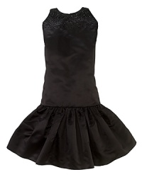 Glimmering tonal beads adorn the top of the classic satin party dress, giving a hint of sparkle to a stylish sleeveless silhouette. Glimmering tonal beads adorn the top of the classic satin party dress, giving a hint of sparkle to a stylish sleeveless silhouette.