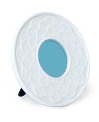 The picture of happiness, Jonathan Adler's Charade Flower frame is hand-carved and cast like a fresh daisy in matte white porcelain. With velvet backing. The picture of happiness, Jonathan Adler's Charade Flower frame is hand-carved and cast like a fresh daisy in matte white porcelain. With velvet backing.