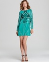 In a tribal-inspired geometric print, Tibi's emerald silk dress a trend-right look on a timelessly ladylike shift silhouette.