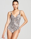 With a keyhole cutout and deep scoop back, Carmen Marc Valvo's snake print maillot is decidedly warm-blooded.