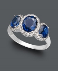 A sumptuous three stone design in brilliant blue hues. Effy Collection's standout ring highlights oval-cut sapphires (2-7/8 ct. t.w.) encircled by round-cut diamonds (1/3 ct. t.w.) set in 14k white gold.