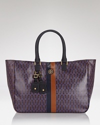 Tory Burch is known for low-key luxe, and this bold tote is the perfect example of the brand's covet-worthy look. Carry it with denim on off-duty days to give casual looks an upgrade. Tory Burch is known for low-key luxe, and this bold tote is the perfect example of the brand's covet-worthy look. Carry it with denim on off-duty days to give casual looks an upgrade.