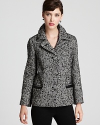 This classic style Milly jacket gets a modern update with oversized buttons and leather trim. This classic style Milly jacket gets a modern update with oversized buttons and leather trim.