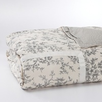 Graceful florals, jacquards and delicate embroidery in a romantic palette of soft silver, cream and blush are layered with a romantic chinoiserie duvet - backed with timeless houndstooth - for an elegant, unexpected twist. Graceful florals, jacquards and delicate embroidery in a romantic palette of soft silver, cream and blush are layered with a romantic chinoiserie duvet - backed with timeless houndstooth - for an elegant, unexpected twist.