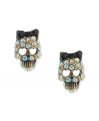 Tough yet tender. A skull motif may have an eerie effect, but Betsey Johnson's stud earrings offer a fun, feminine twist with glittering multicolored crystals, heart-shaped eye details and a bow accent. Crafted in mixed metal. Approximate diameter: 4/10 inch. Tough yet tender. A skull motif may have an eerie effect, but Betsey Johnson's stud earrings offer a fun, feminine twist with glittering multicolored crystals, heart-shaped eye details and a bow accent. Crafted in mixed metal. Approximate diameter: 4/10 inch.