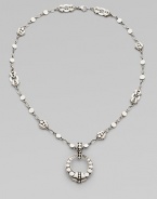 From the Dot Collection. An open circle pendant hangs from a sautoir link necklace, all of sterling silver in the distinctive dot design.Sterling silver Chain length, about 18 Pendant diameter, about 1¼ Lobster clasp Made in Bali