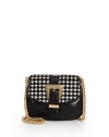 THE LOOKGoldtone shoulder chainHoundstooth printed calf hair flapBuckle strap front detailSnap flap closureOne inside open pocketInside logo tagTHE FITShoulder chain, 20 drop8½W X 7H X 1½DTHE MATERIALCalf hairLeatherFully linedORIGINImported