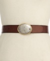 Add vintage appeal to your already chic look with this plaque-topped leather belt from Fossil. Team them up with some high boots for a kickin' look.