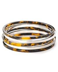 Glamor defined: Tortoise shell and silver plated metal mingle on your wrist for classically styled confidence. Stack these styles from Lauren Ralph Lauren.