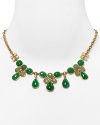 Clustered with jade, aventurine, and crystal stones, Carolee Lux's plated frontal necklace is a bold take on the floral motif.