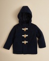 Keep him warm and bundled up in this classic hooded toggle jacket with quilted lining.