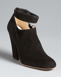 These chic Chloé booties work two ways: wear them with the strap with skirts or strapless with skinnies. These chic Chloé booties work two ways: wear them with the strap with skirts or strapless with skinnies.