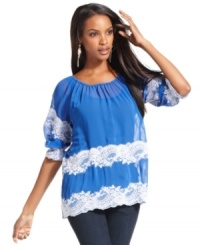 A peasant top goes in a flirty new direction: INC accents this sheer, ethereal blouse with delicate lace. A peasant top goes in a flirty new direction: INC accents this sheer, ethereal blouse with delicate lace.